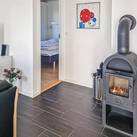 Holiday home Cozy In With Sauna Lokken